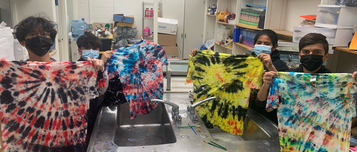 Walton art students show off their tie-dyed shirts.